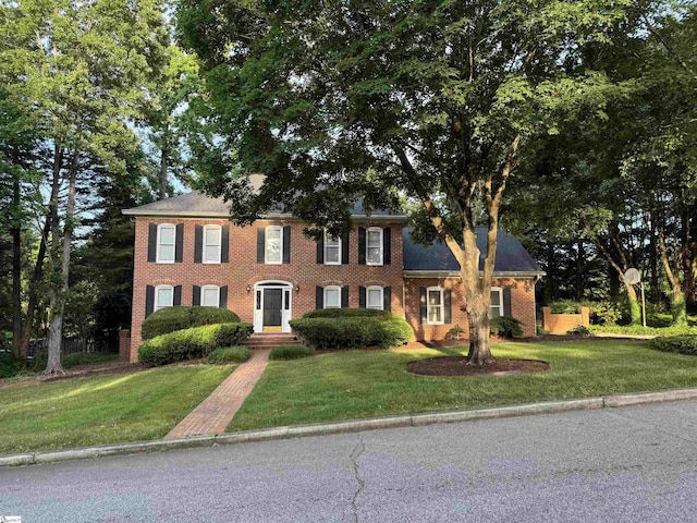 102 Quail Creek Ln, Greenville, SC 29615 - colonial inspired home featuring brick siding and a front lawn