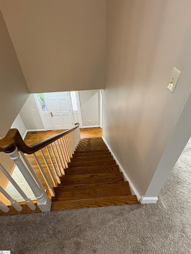 102 Quail Creek Ln, Greenville, SC 29615 - stairway with baseboards and carpet floors