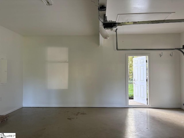 102 Quail Creek Ln, Greenville, SC 29615 - garage with electric panel, baseboards, and a garage door opener