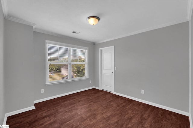 606 N Meadows Ln, Easley, SC 29642 - spare room featuring dark wood-style floors, crown molding, and baseboards