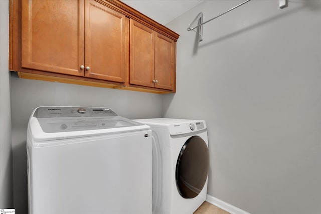606 N Meadows Ln, Easley, SC 29642 - laundry room with cabinet space, separate washer and dryer, and baseboards