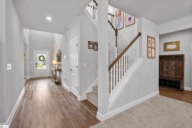 907 Whitemarsh Ave, Simpsonville, SC 29680 - foyer featuring wood finished floors, baseboards, stairs, recessed lighting, and a towering ceiling