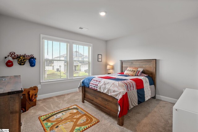 907 Whitemarsh Ave, Simpsonville, SC 29680 - carpeted bedroom featuring baseboards