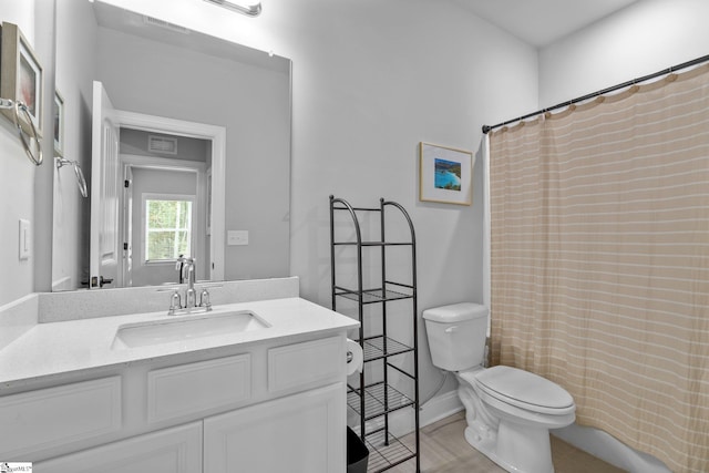 907 Whitemarsh Ave, Simpsonville, SC 29680 - bathroom featuring toilet, vanity, and curtained shower