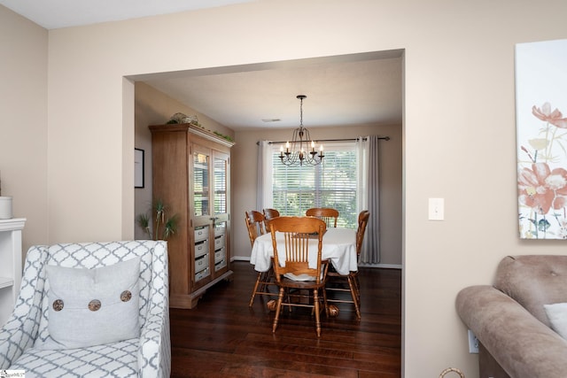 113 Faulkner Cir, Greer, SC 29651 - dining area with dark wood-type flooring, a chandelier, and baseboards