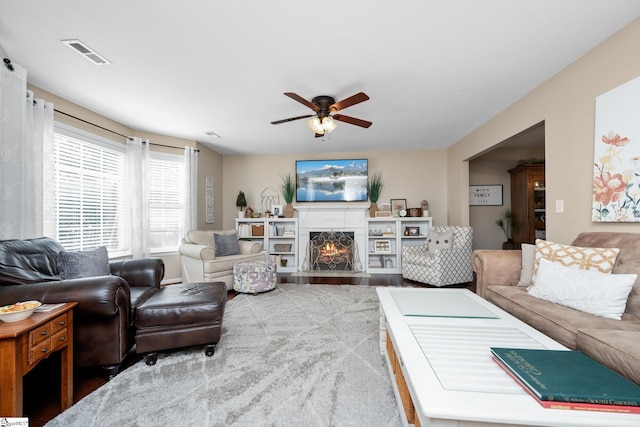113 Faulkner Cir, Greer, SC 29651 - living area with a ceiling fan, a fireplace with flush hearth, and wood finished floors