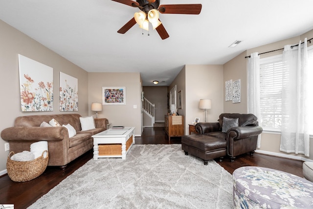113 Faulkner Cir, Greer, SC 29651 - living area featuring wood finished floors, stairway, baseboards, and a ceiling fan