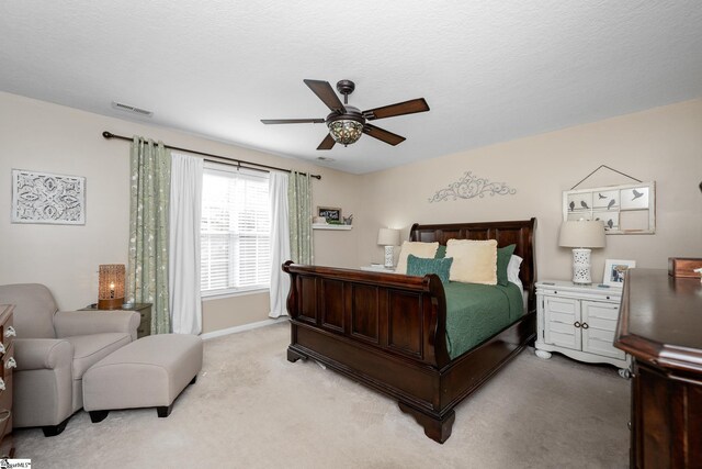 113 Faulkner Cir, Greer, SC 29651 - bedroom with light colored carpet, baseboards, and a ceiling fan
