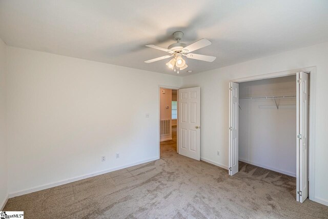 301 S Cassidy Way, Campobello, SC 29322 - unfurnished bedroom with carpet floors, baseboards, a ceiling fan, and a closet