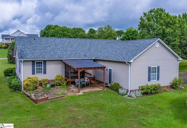 301 S Cassidy Way, Campobello, SC 29322 - rear view of house featuring roof with shingles, a yard, and a patio area