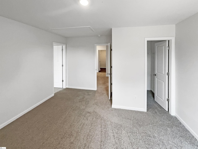 3740 Brookshade Trl, Moore, SC 29369 - unfurnished bedroom featuring attic access, carpet floors, baseboards, and a spacious closet