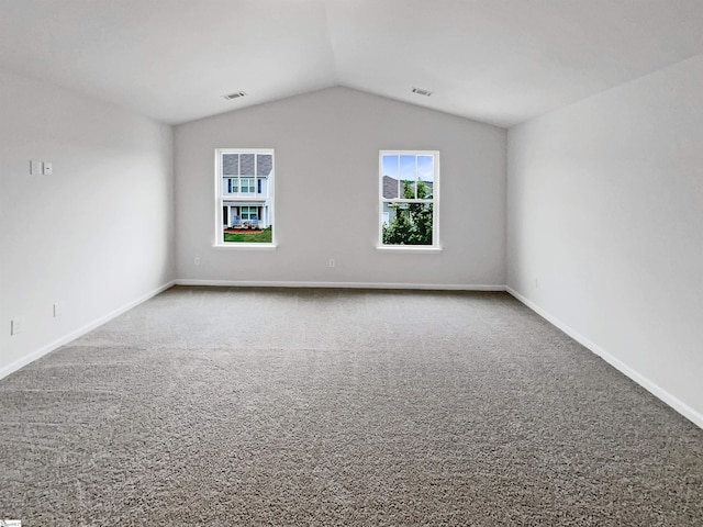 3740 Brookshade Trl, Moore, SC 29369 - spare room featuring carpet, vaulted ceiling, and baseboards