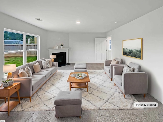 3740 Brookshade Trl, Moore, SC 29369 - living room featuring baseboards, a fireplace with flush hearth, and recessed lighting