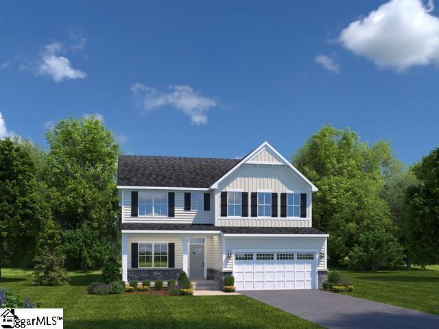 7 Furness Dr, Fountain Inn, SC 29644 - view of front of property with an attached garage, a front yard, driveway, and board and batten siding