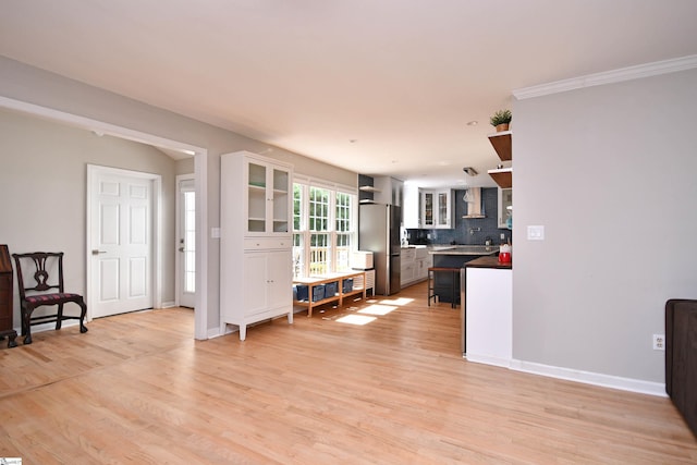 210 Cross Field Rd, Greenville, SC 29607 - kitchen featuring open shelves, freestanding refrigerator, wall chimney exhaust hood, decorative backsplash, and light wood-style floors