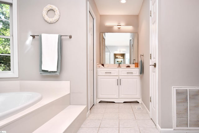 210 Cross Field Rd, Greenville, SC 29607 - bathroom with tile patterned floors, a bath, vanity, and baseboards