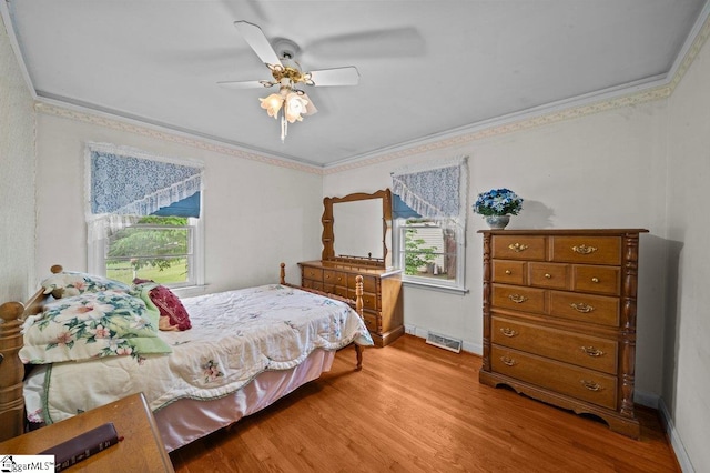 228 Styles Rd, Taylors, SC 29687 - bedroom with ornamental molding, light wood-type flooring, ceiling fan, and baseboards