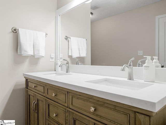 full bathroom featuring double vanity