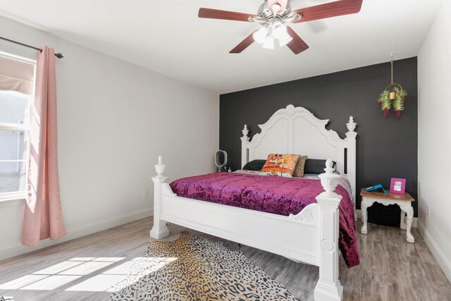640 Slippery Moss Dr, Spartanburg, SC 29303 - bedroom with wood finished floors, baseboards, and a ceiling fan