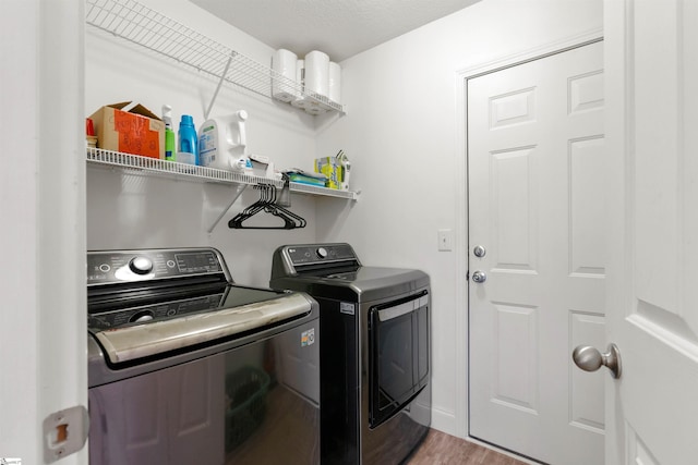 640 Slippery Moss Dr, Spartanburg, SC 29303 - laundry room featuring independent washer and dryer and wood finished floors