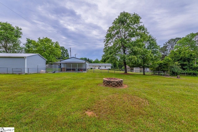 217 Ponder Rd, Greer, SC 29651 - view of yard with an outdoor fire pit