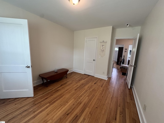 422 E Savannah St, Calhoun Falls, SC 29628 - bedroom featuring wood finished floors and baseboards