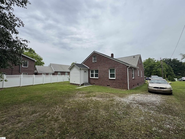 422 E Savannah St, Calhoun Falls, SC 29628 - rear view of house featuring brick siding, entry steps, and crawl space