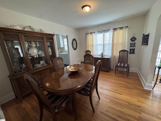 422 E Savannah St, Calhoun Falls, SC 29628 - dining room with light wood finished floors and baseboards