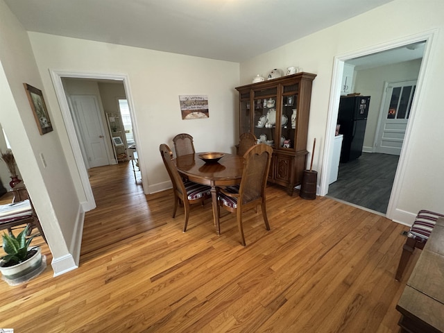422 E Savannah St, Calhoun Falls, SC 29628 - dining room featuring light wood finished floors and baseboards