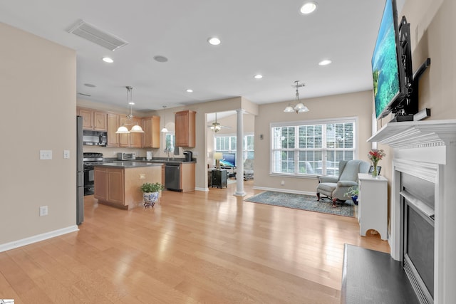 508 Inner Banks Rd, Boiling Springs, SC 29316 - living room featuring decorative columns, a fireplace with flush hearth, light wood finished floors, baseboards, and recessed lighting