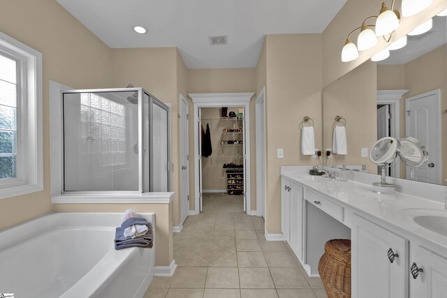 508 Inner Banks Rd, Boiling Springs, SC 29316 - full bathroom with a shower stall, a garden tub, tile patterned flooring, double vanity, and a spacious closet