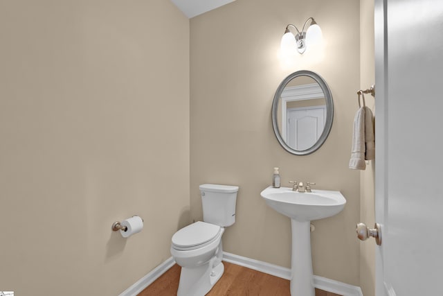 508 Inner Banks Rd, Boiling Springs, SC 29316 - bathroom with toilet, wood finished floors, and baseboards