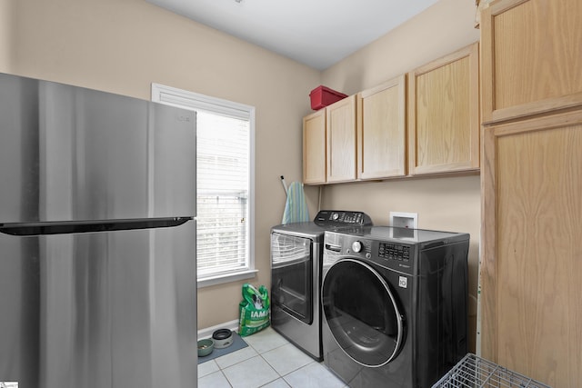 508 Inner Banks Rd, Boiling Springs, SC 29316 - laundry room with cabinet space, light tile patterned floors, washer and dryer, and baseboards
