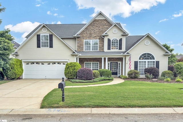 508 Inner Banks Rd, Boiling Springs, SC 29316 - traditional-style house featuring a garage, driveway, a front lawn, and stone siding
