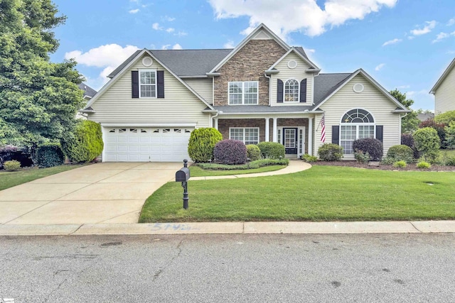 508 Inner Banks Rd, Boiling Springs, SC 29316 - traditional-style house featuring concrete driveway, an attached garage, a front lawn, and stone siding