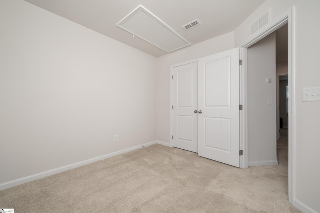 23 Verdant Leaf Way, Greenville, SC 29617 - unfurnished bedroom with attic access, light carpet, and baseboards