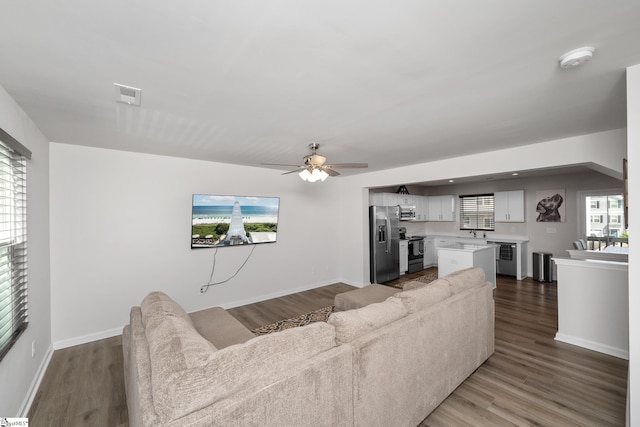 23 Verdant Leaf Way, Greenville, SC 29617 - living room with dark wood-style flooring, ceiling fan, and baseboards