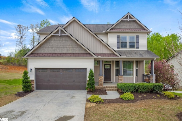 9 Amber Oaks Dr, Greer, SC 29651 - craftsman inspired home featuring covered porch, a standing seam roof, concrete driveway, and a garage