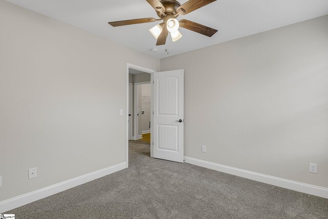 9 Amber Oaks Dr, Greer, SC 29651 - spare room featuring light carpet, baseboards, a ceiling fan, and a smoke detector