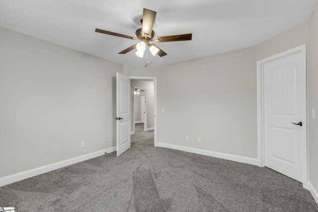 9 Amber Oaks Dr, Greer, SC 29651 - unfurnished bedroom with carpet flooring, baseboards, and a ceiling fan