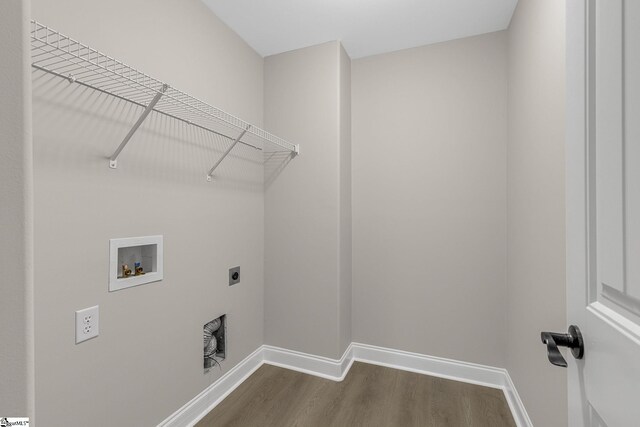 9 Amber Oaks Dr, Greer, SC 29651 - washroom featuring hookup for a washing machine, hookup for an electric dryer, dark wood finished floors, and baseboards