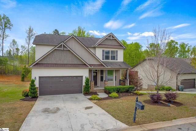 9 Amber Oaks Dr, Greer, SC 29651 - craftsman inspired home featuring a porch, concrete driveway, a front yard, a garage, and roof with shingles