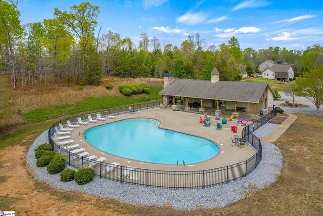9 Amber Oaks Dr, Greer, SC 29651 - community pool featuring a patio