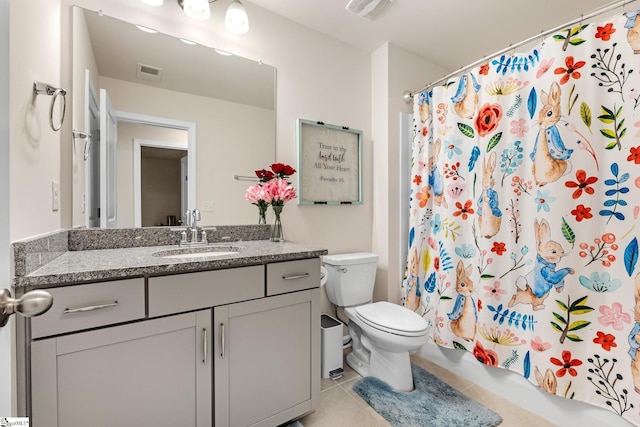 319 Sudduth Farms Dr, Greer, SC 29650 - bathroom with tile patterned flooring, toilet, and vanity