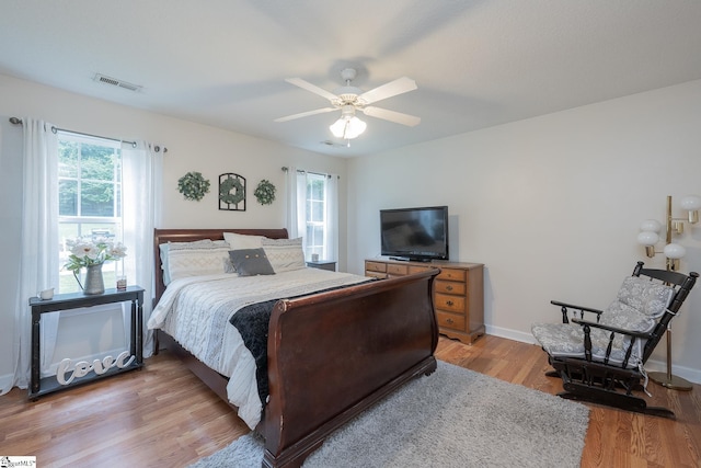 1198 Dalrymple Rd, Anderson, SC 29621 - bedroom featuring multiple windows, light wood-style floors, ceiling fan, and baseboards