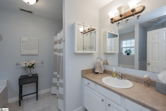 1198 Dalrymple Rd, Anderson, SC 29621 - bathroom featuring vanity, a chandelier, baseboards, and tile patterned floors