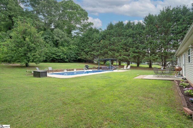 1198 Dalrymple Rd, Anderson, SC 29621 - view of grassy yard with an outdoor pool, a pergola, and a patio area