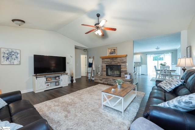 1198 Dalrymple Rd, Anderson, SC 29621 - living area with a ceiling fan, lofted ceiling, dark wood-style floors, baseboards, and a stone fireplace