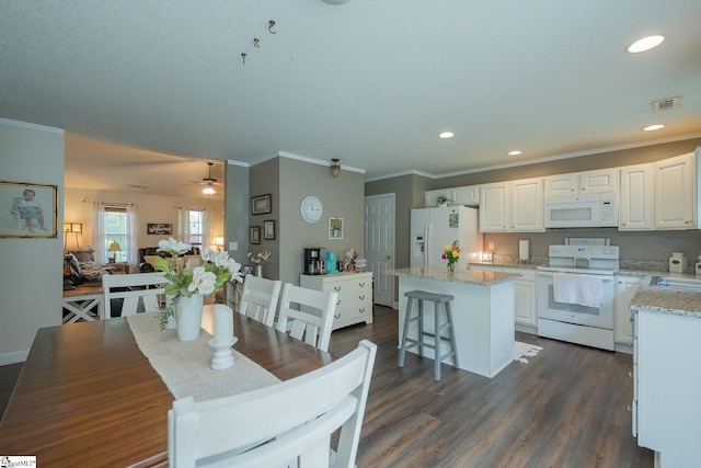 1198 Dalrymple Rd, Anderson, SC 29621 - dining space with ornamental molding, dark wood-type flooring, ceiling fan, and recessed lighting