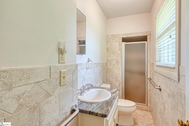 129 E Main St, Duncan, SC 29334 - bathroom with tile walls, a stall shower, vanity, tile patterned flooring, and toilet